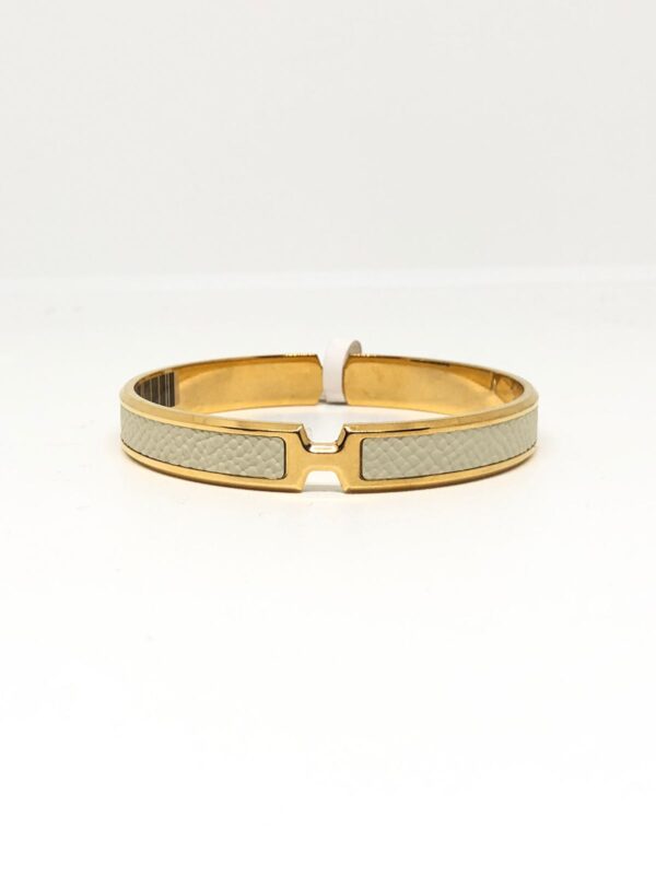 HERMES CLIC H BRACELET WHITE & GOLD STAINLESS